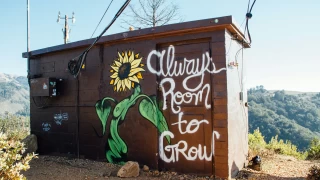 "Always room to grow" op de zijkant van de elektrische kamer